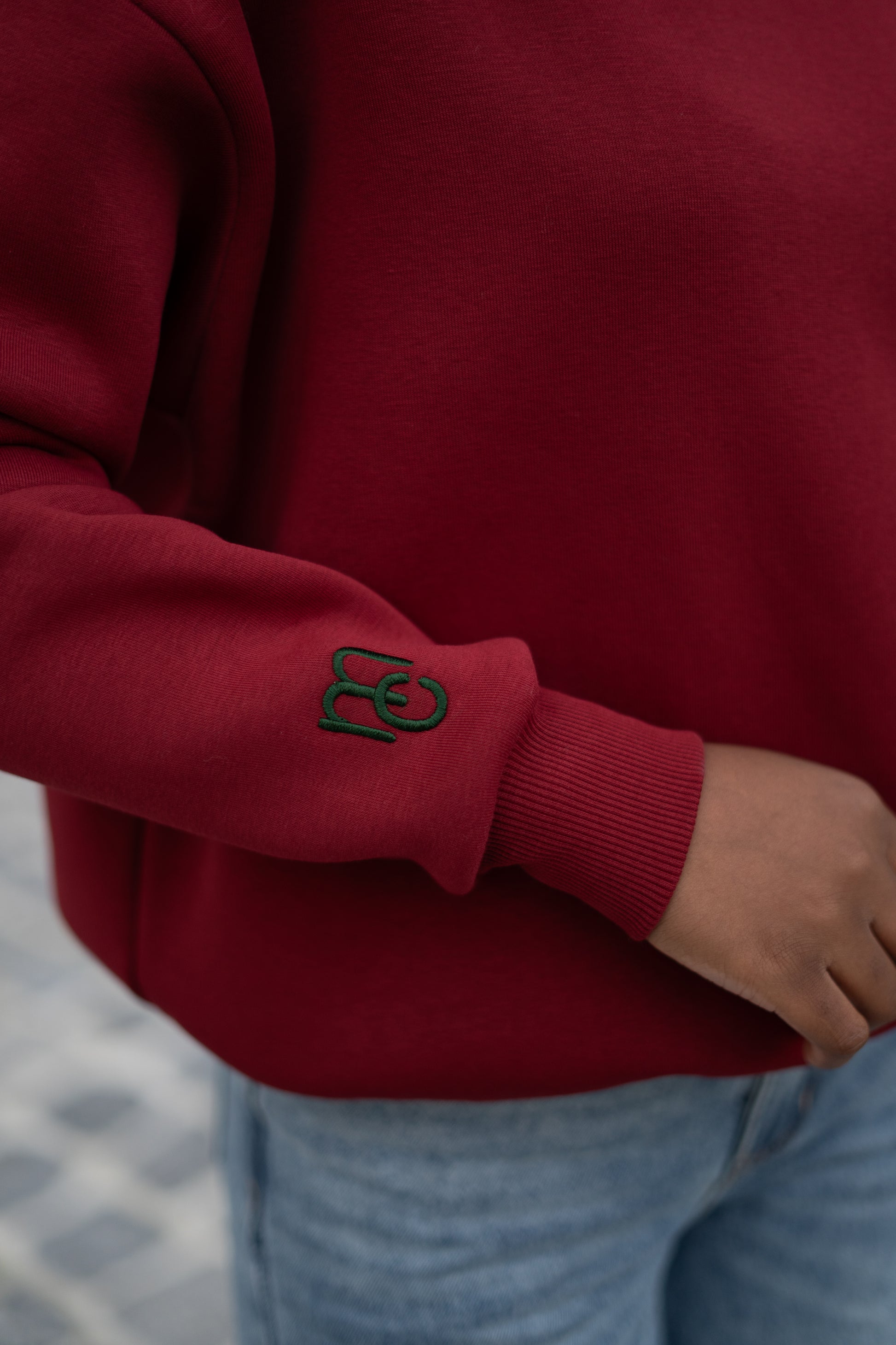 Rode sweater met MC logo